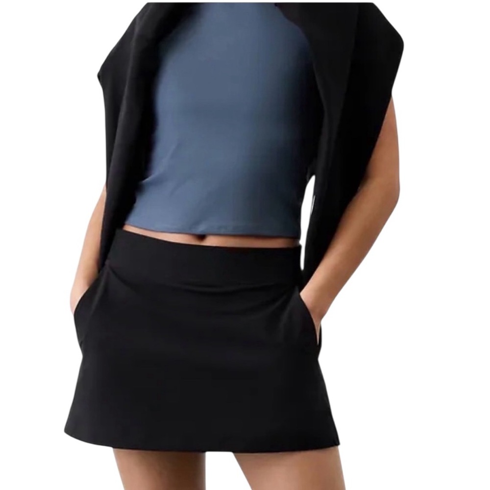 Athleta black tennis mini skort with built in shorts size M like new condition